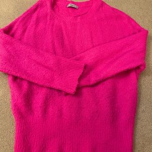 Neon pink knit sweater from Zara